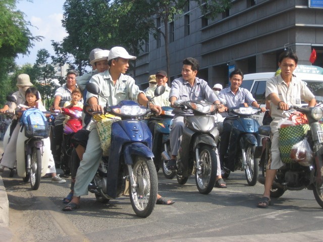 Motorcycle Riders in the Streets awaiting a light change