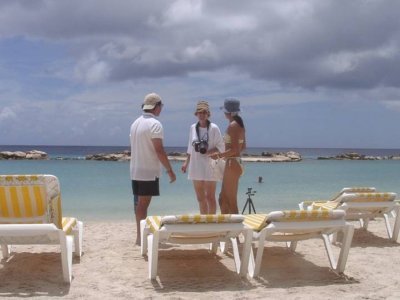 Columbian photographer taking pictures for new sea acquarium brochure in Curacao